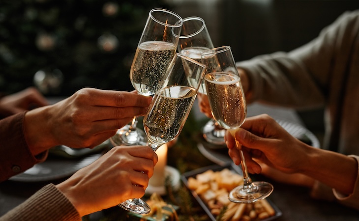 Cheers with sparkling drinks during celebration